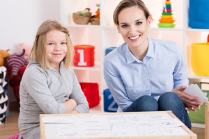 Pediatric Occupational Therapist with young child